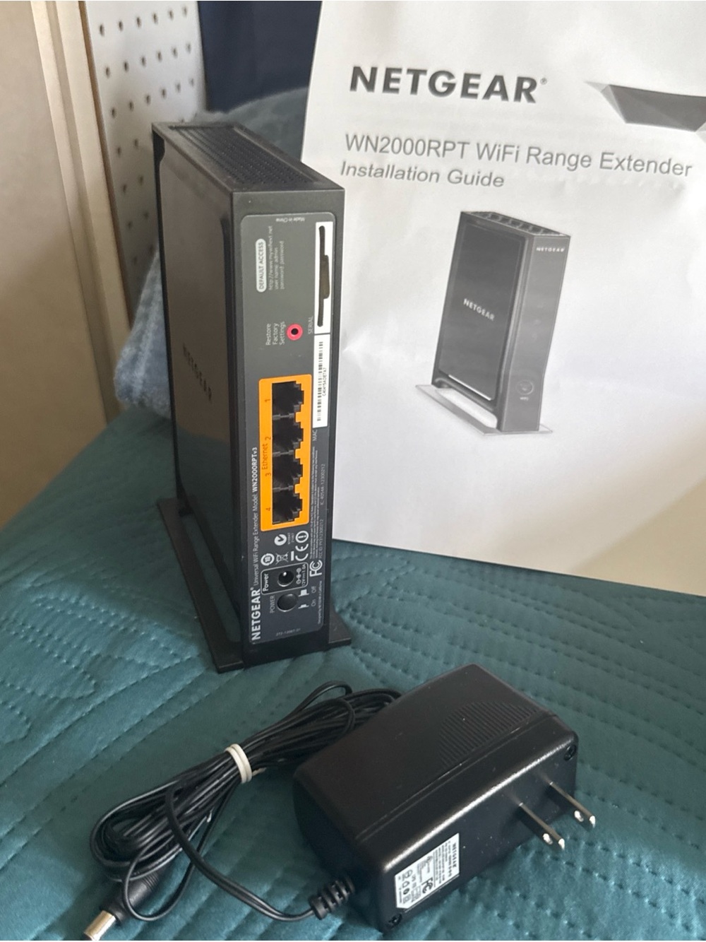 NETGEAR Black WiFi Range Extender with Yellow Ethernet Ports